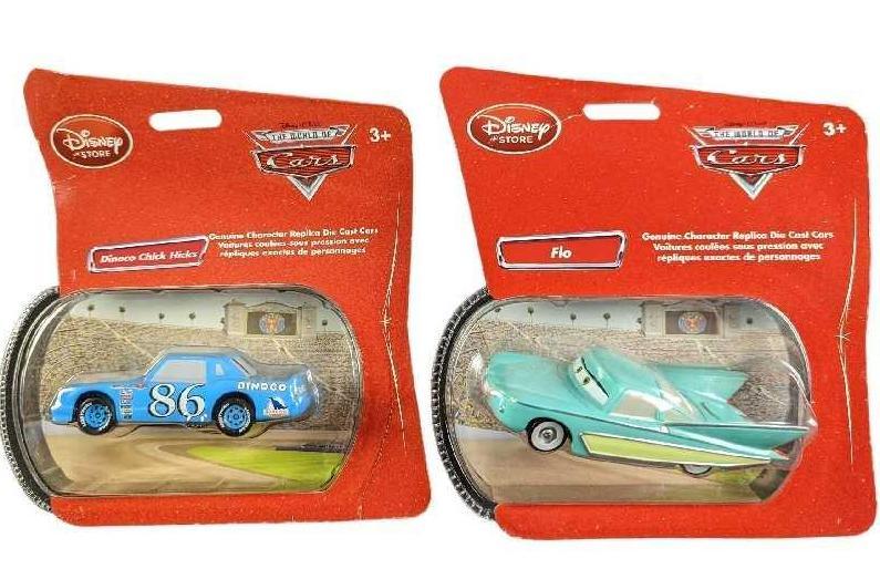 World of Cars Flo & Dinoco Chick Hicks McQueen: This lot consists of: (1) Flo 121. 1:48 Genuine Character Replica Die Cast Car. Comes in its original packaging which is approx 7" x 2" x 8". (1) Dinoco Chick Hicks 121. 1:48 Genuine Character Replica