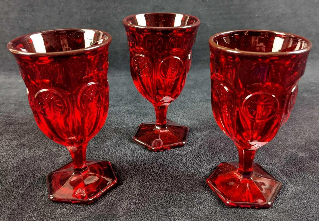 Three Fostoria Ruby Coin Wine Glasses: Three Vintage Retired Fostoria Ruby Coin Wine Glasses. This deign was released from 1969 to 1981. Each glass is approx 3" x 3" x 5" and are in a good,vintage condition with no known damage.