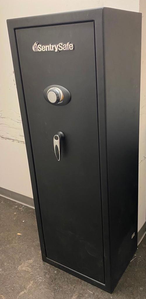 Sentry Safe Model G5241-2st Gun Safe: Sentry Safe Model G5241-2st Executive/Gun Safe Gun safe with 3-number combination lock by Sentry. The safe has a shelf at the top with a small locked cabinet for ammo or belongings. In good condition