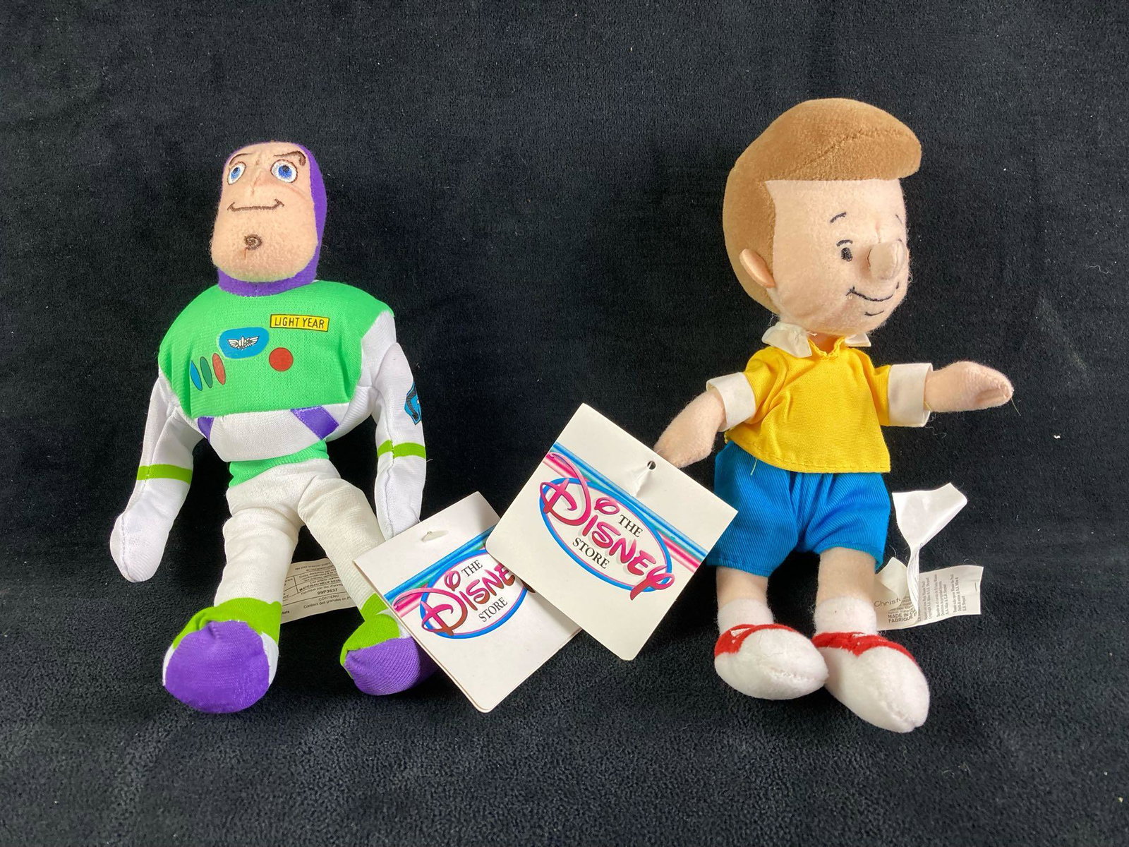 Set of (2) Disney Plush Bean Bag Dolls Buzz Lightyear and Christopher Robin: Up for auction is a recent estate find, a set of (2) Disney plush bean bag dolls that depict Buzz lightyear and Christopher Robin from the classic Disney films Toy Story and Winnie the Pooh. This auct