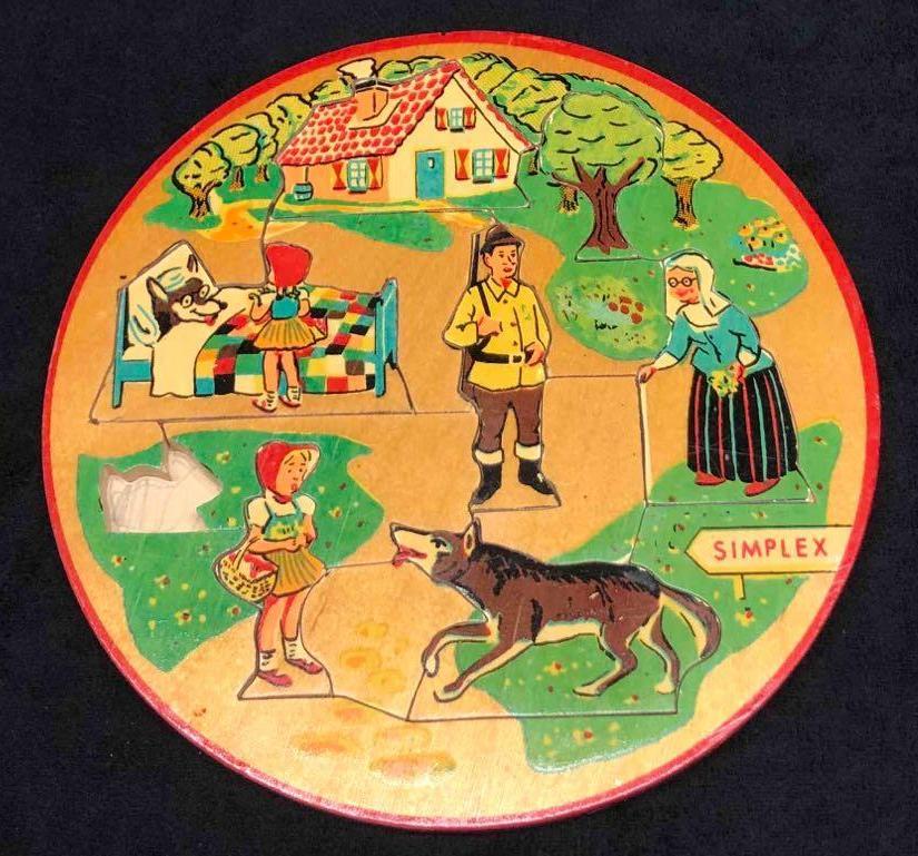 Vintage Little Red Riding Hood Simplex Wood Puzzle: This lot contains a vintage Little Red Riding Hood Simplex Wood Puzzle. The puzzle is missing one piece the small rabbit that goes in the left corner. It is approx 7 1/2" x 7 1/2" x 1/4" and weighs ab