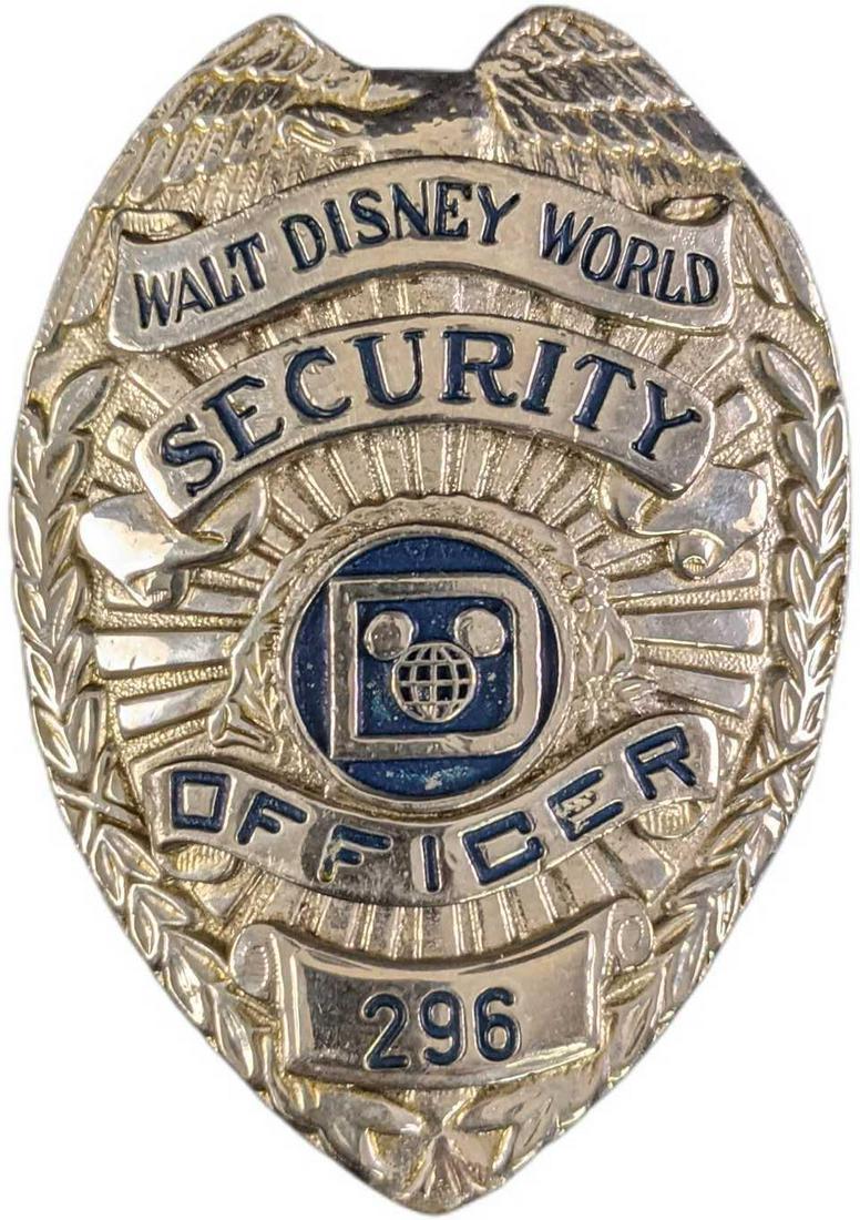 1970s/1980s Disney World Security Metal Badge: 1970s/1980s Disney World Security Metal Badge. Is approx 2 1/4" x 3/4" x 3" and it weighs under one pound at 0.14lb. The metal badge is in a good, vintage condition with some wear, paint loss and mini