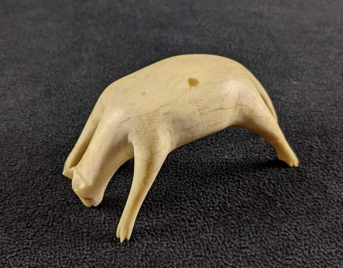 Antique Rare Bone Carved Animal Figurine: Antique Bone Carved Animal Figurine This is an antique bone-carved animal. One part of a leg is missing but the rest is in good condition. The figurine stands well despite the leg. This is a rare bone