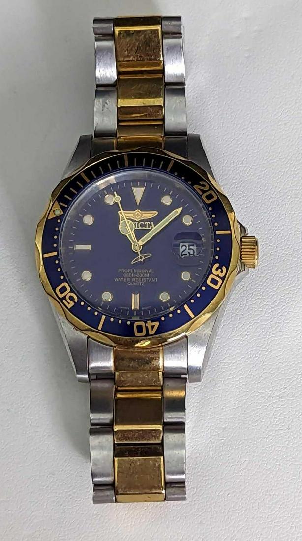 Invicta 8935 Men's Stainless Steel Watch: Invicta 8935 Men's Stainless Steel Watch. DETAILS: Manufacturer - Invicta Model - 8935 A Movement - Quartz Case - Stainless Steel - 37.5mm Bracelet - Stainless Steel Features - Luminous Hands, Shock-R