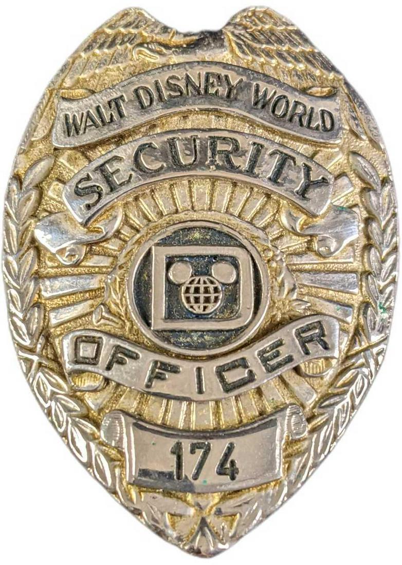 1970/1980s Disney World Security Metal Badge: 1970/1980s Disney World Security Metal Badge. Is approx 2" x 1" x 3" and it weighs under one pound at 0.13lb. The metal badge is in a good, vintage condition with some wear on the front, some color lo