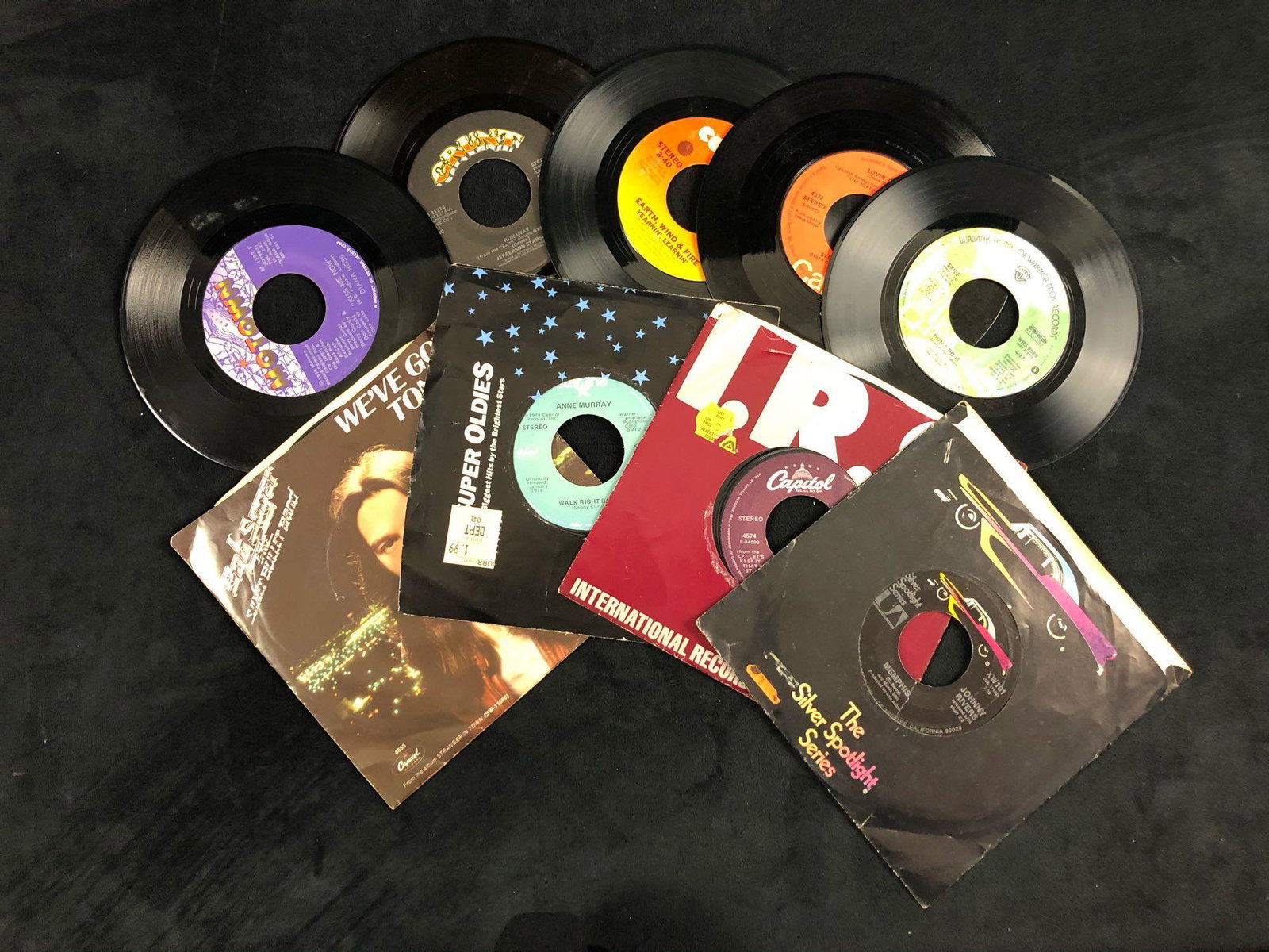 Lot Of 9 Vintage Vinyl 45 RPM 1970's Collection Diana Ross Ann Murray Bob Seger Starship: Lot Of 9 Vintage Vinyl 45 RPM 1970's Collection Diana Ross Ann Murray Bob Seger Starship This lot features 9 vintage 45 RPM music from the 70's. In good vintage condition with some known scuff marks o
