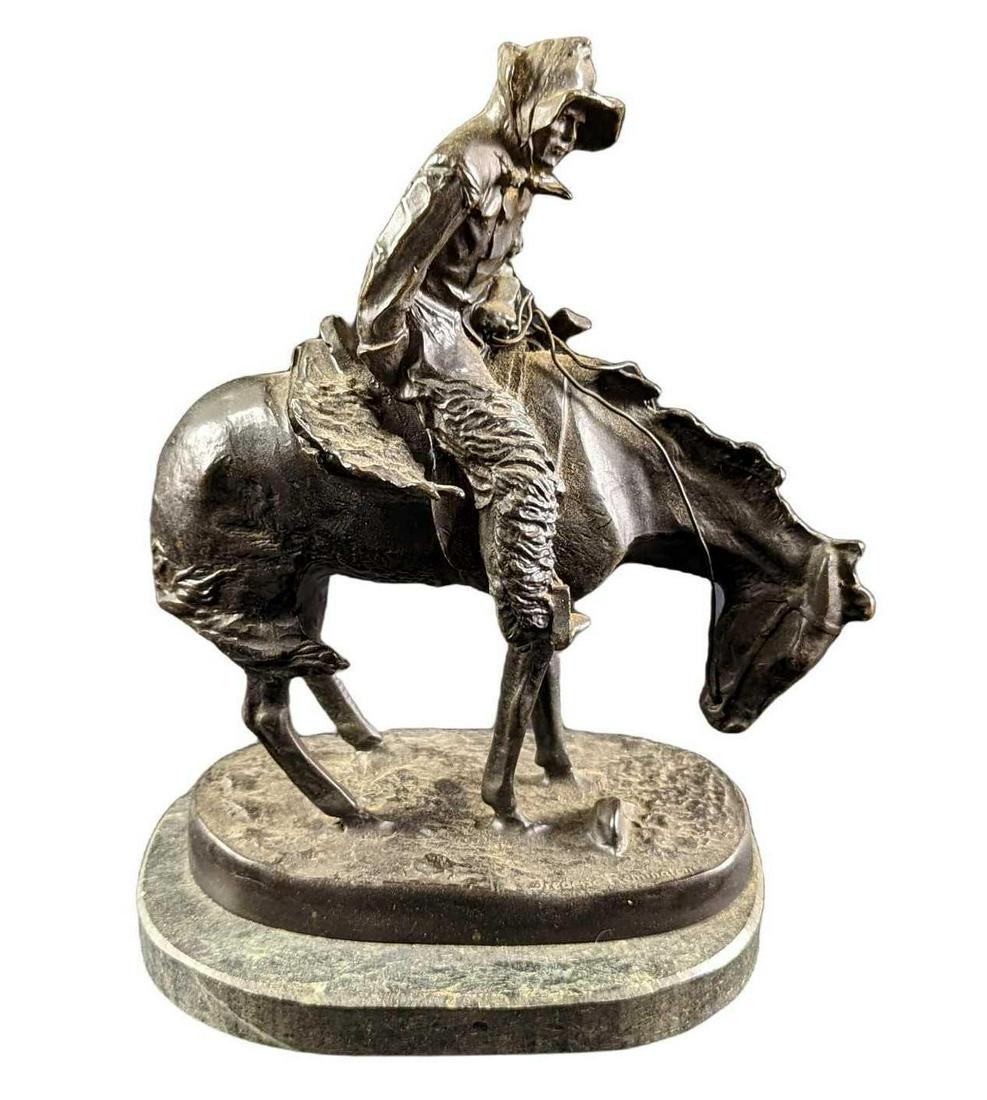 Norther Mini Bronze Figurine Frederic Remington: This Norther bronze depicts the hard lifestyle of a cowboy in the colder seasons. In a successful attempt to capture the harsh conditions of weather and season on the lives and livelihoods of the west