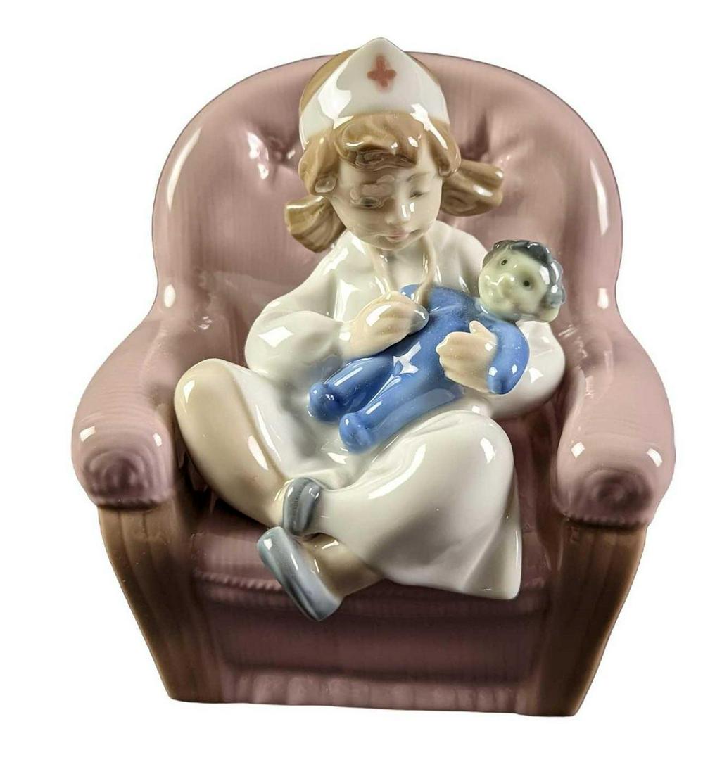 Nao Lladro Figurine Girl Nurse In Chair With Doll (1 of 11)