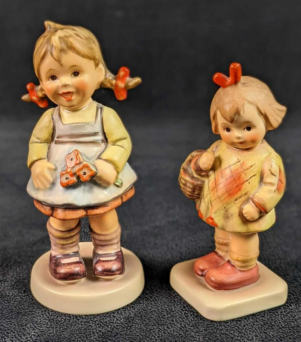 Goebel Hummel Club Figurines I Brought You A Gift And Flower Girl Special: This lot includes: (1) Flower Girl. HUM 548. TMK-7. Exclusive Edition. 5th Year Membership M.I. Hummel Club. Is approx 2 1/2" x 2" x 4 1/2". Is in a good, used condition with no known da