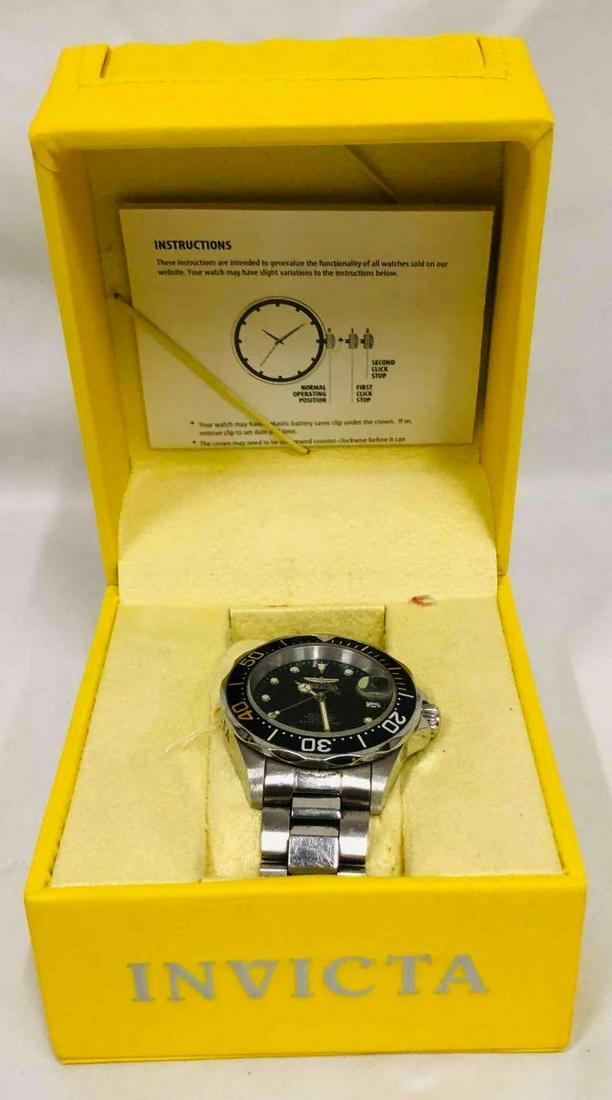 Invicta Watch 17039 Automatic Professional All Stainless Steel Water Resistant 200M: This lot contains a Invicta Watch 17039 Automatic Professional All Stainless Steel Water Resistant 200M. The watch comes in its original box with instructions on use, care, etc. The box is approx 3 3/