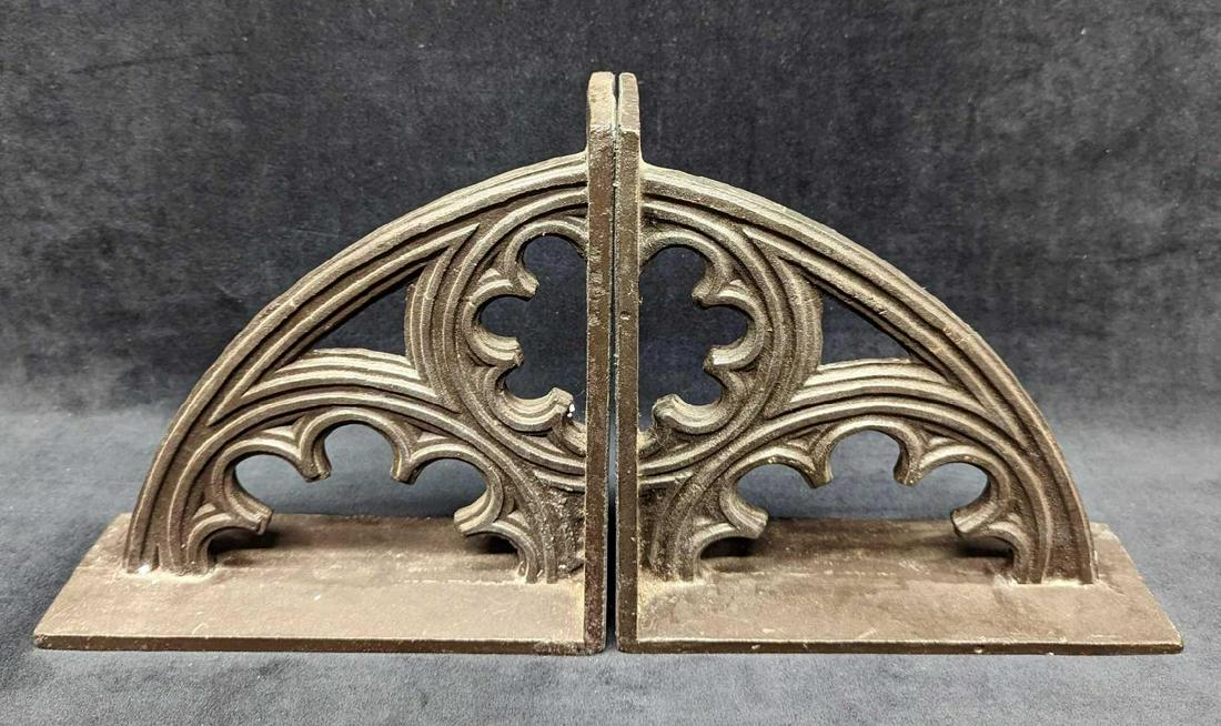 Vintage Cast Iron Bookends Doorstops: Vintage Cast Iron Bookends Doorstops. Can be used as a bookend or doorstop. Each is approx 10" x 3 1/2" x 9 3/4" and together they weigh 20lbs. Both are in good, vintage condition with ver