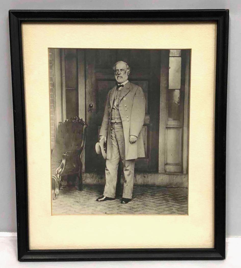 Framed Reproduction Photograph Of Robert E. Lee: This lot contains a framed reproduction photograph of Robert E. Lee. The frame is approx 11 1/2" x 9 3/4" while the photo itself is approx 7 3/4" x 6 1/2". Together the frame and photo