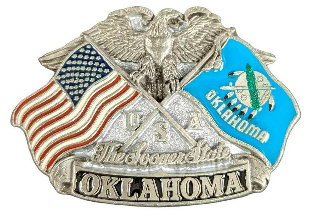 Vintage Full Sized Metal Oklahoma Flags Belt Buckle: Vintage Full Sized Metal Oklahoma Flags Belt Buckle. By the "Great American Buckle Company. This is approx 3 1/4" x 2 1/4" and it weighs 0.21lb. The belt buckle is in a good, vintage condi