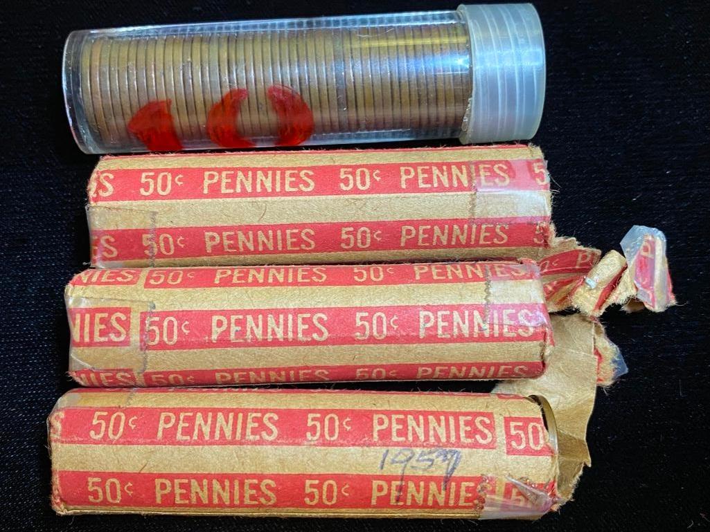 4 Rolls of Wheat Pennies: 4 Rolls of Wheat Pennies Wheat pennies in four rolls, two are open on one end. Each roll has approximately 50 pennies. Pennies are in different conditions and with different mint marks, most are from