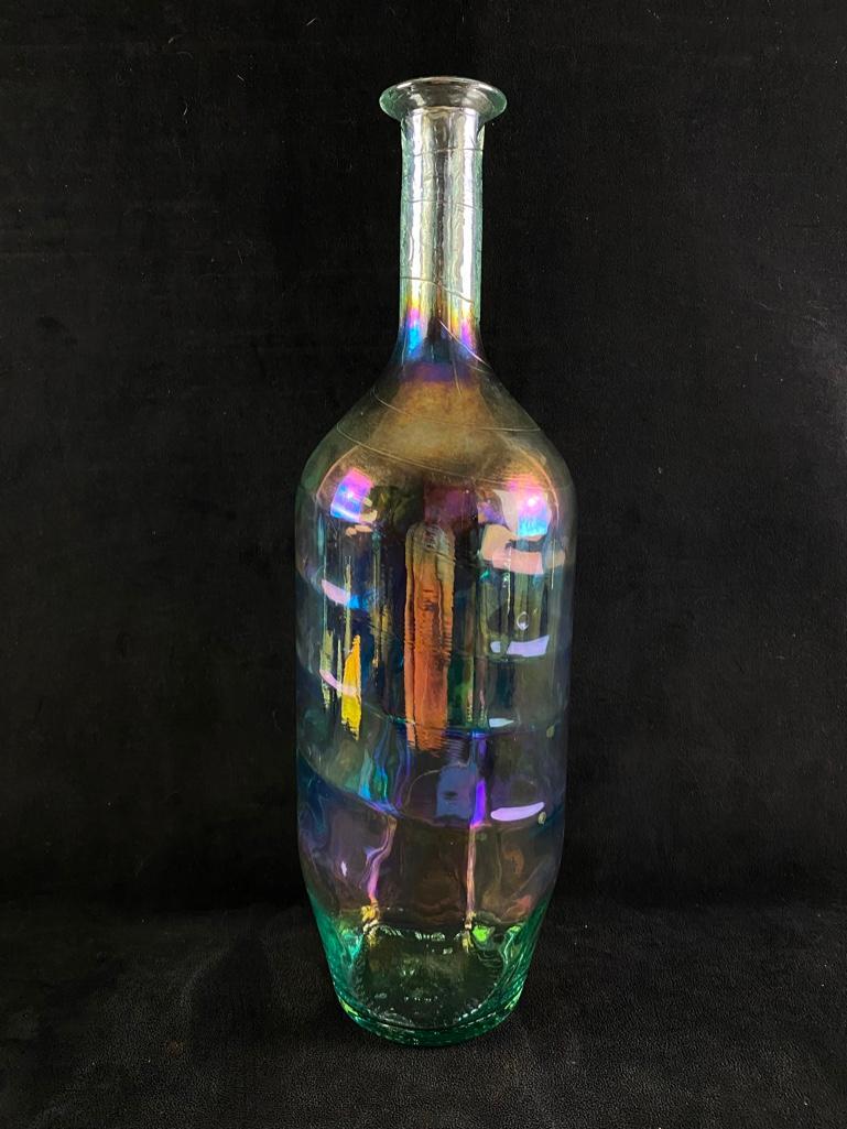 Iridescent Glass Floor Vase: Iridescent Glass Floor Vase Large bottle-shaped floor vase with along neck. The glass has an iridescent hue, that looks stunning in the light. In good condition with no known chips and cracks. There