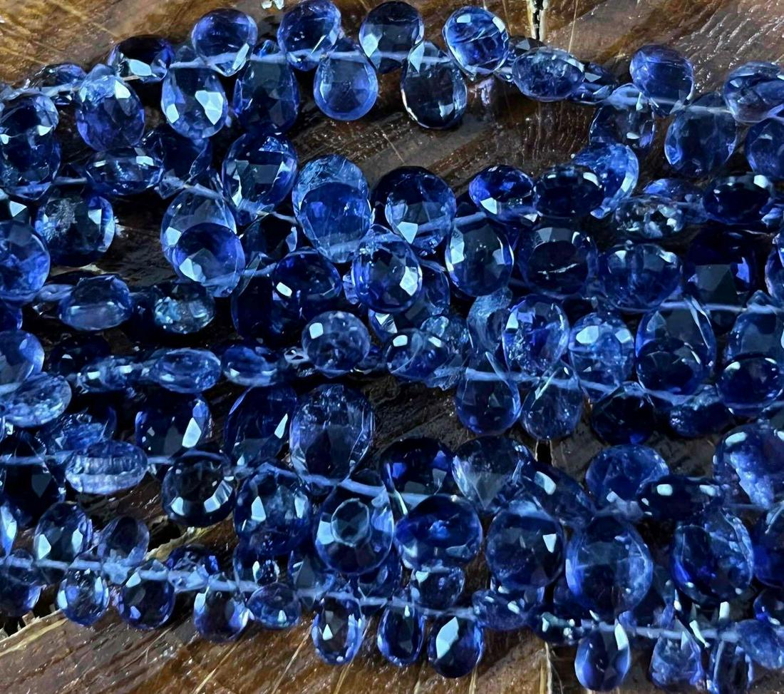 Iolite Blue Gemstone Faceted Beads 6 Strands 3-6mm: Iolite Blue Gemstone Faceted Beads 6 Strands 3-6mm Here is a lovely lot of Iolite stones for that jewelry artist out there. Also, a great set to purchase and have a jeweler design a one-of-a-kind piec