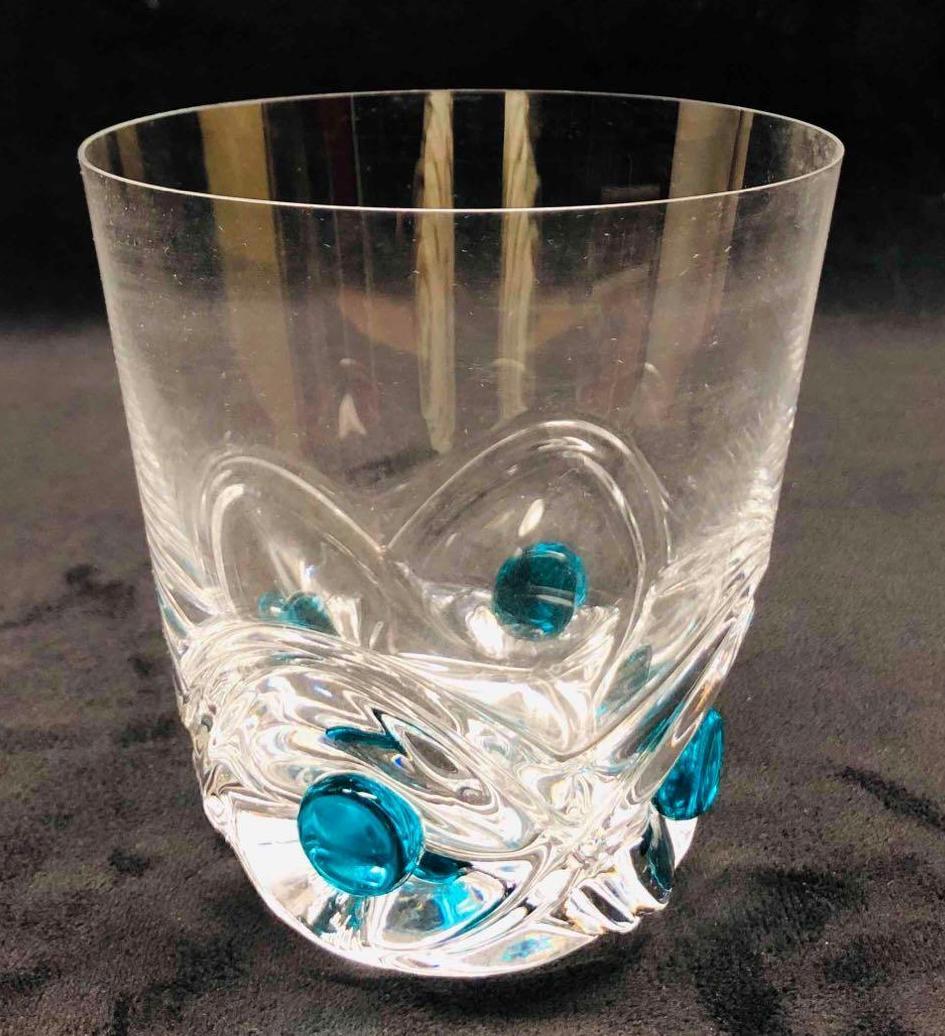 Lalique Signed French Crystal Floride Whiskey Glass: This lot contains Lalique Signed French Crystal Floride Whiskey Glass. It is approx 4" x 4" x 4 1/2" and it weighs about 0.8lbs. Overall the Lalique glass is in good used condition with so