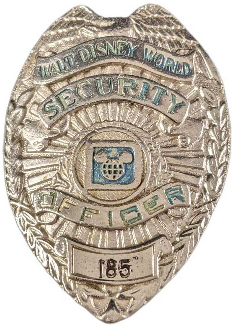 1970/1980s Disney World Security Metal Badge: 1970/1980s Disney World Security Metal Badge. Is approx 2" x 1" x 3" and it weighs under one pound at 0.11lb. The metal badge is in a good, vintage condition with some wear on the front, s