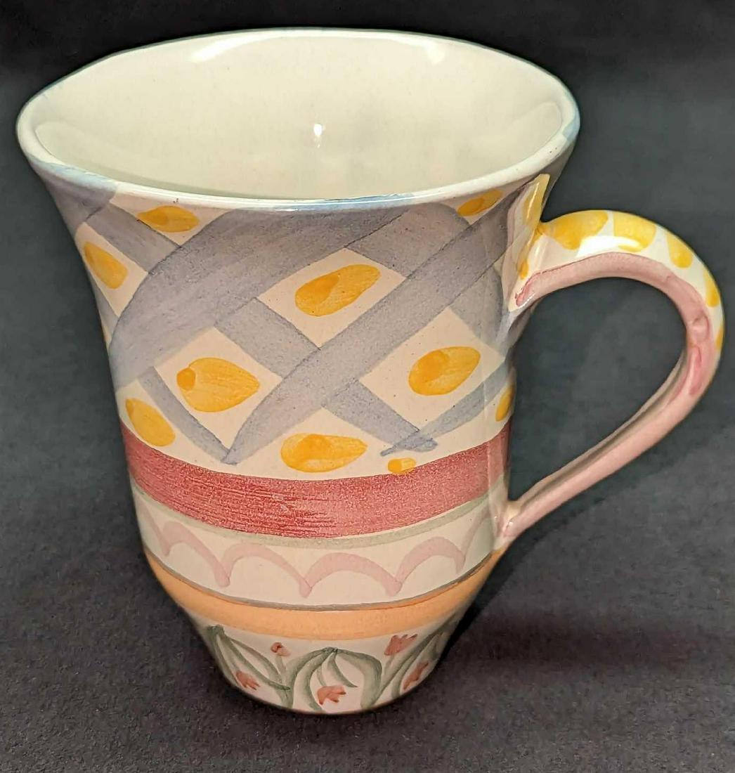 MacKenzie-Childs Pottery Aalsmeer Mug B: MacKenzie-Childs Pottery Aalsmeer Mug B. This retired Aalsmeer-style hand-painted mug is approx 5" x 4" x 4 1/2" and it weighs 0.84lb. The mug has some markings inside. MacKenzie-Childs, L