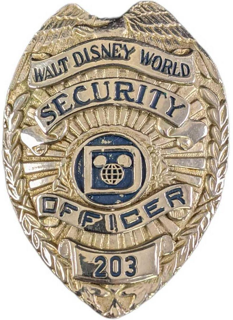 1970s/1980s Disney World Security Metal Badge: 1970s/1980s Disney World Security Metal Badge. Is approx 2 1/4" x 3/4" x 3" and it weighs under one pound at 0.15lb. The metal badge is in a good, vintage condition with some wear,and mini