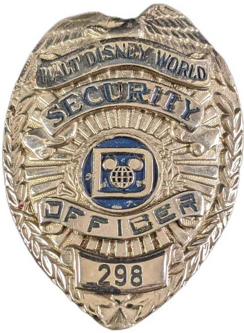 1970s/1980s Disney World Security Metal Badge: 1970s/1980s Disney World Security Metal Badge. Is approx 2 1/4" x 3/4" x 3" and it weighs under one pound at 0.13lb. The metal badge is in a good, vintage condition with some wear, paint l