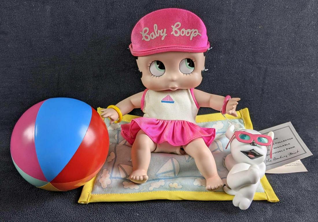Betty Boop Baby Boop Porcelain Beach Party: Betty Boop Baby Boop Porcelain Beach Party This porcelain doll is baby Betty Boop known as Babby Boop. This set does not come in its original box. The doll is approximately 8in long, her legs, arms, a
