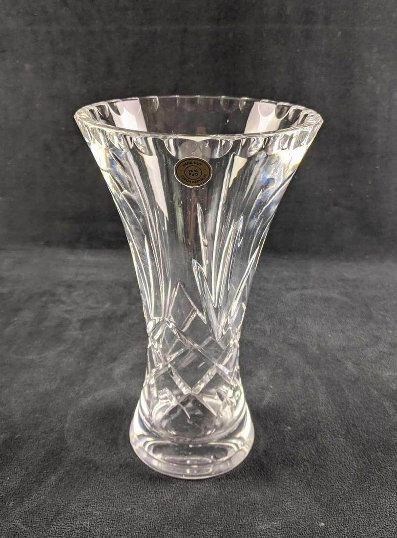 Crystal Vase Hand Cut Crystal: Crystal Vase Hand Cut Crystal This is a crystal vase made with lead crystal. It was made in the Czech Republic. It is in good condition with no known damage. 12in tall Weight: 3.4lbs