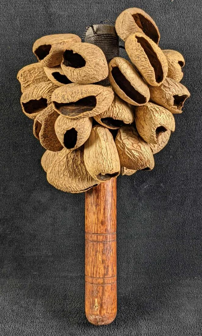 Handmade Indonesian Balinese Shaker: These are made from rainforest seeds and bamboo traditionally shaken during festivals and rituals. This was hand-made in Indonesia. This is approx 5" x 5"x 9 1/2" and it weighs under one p