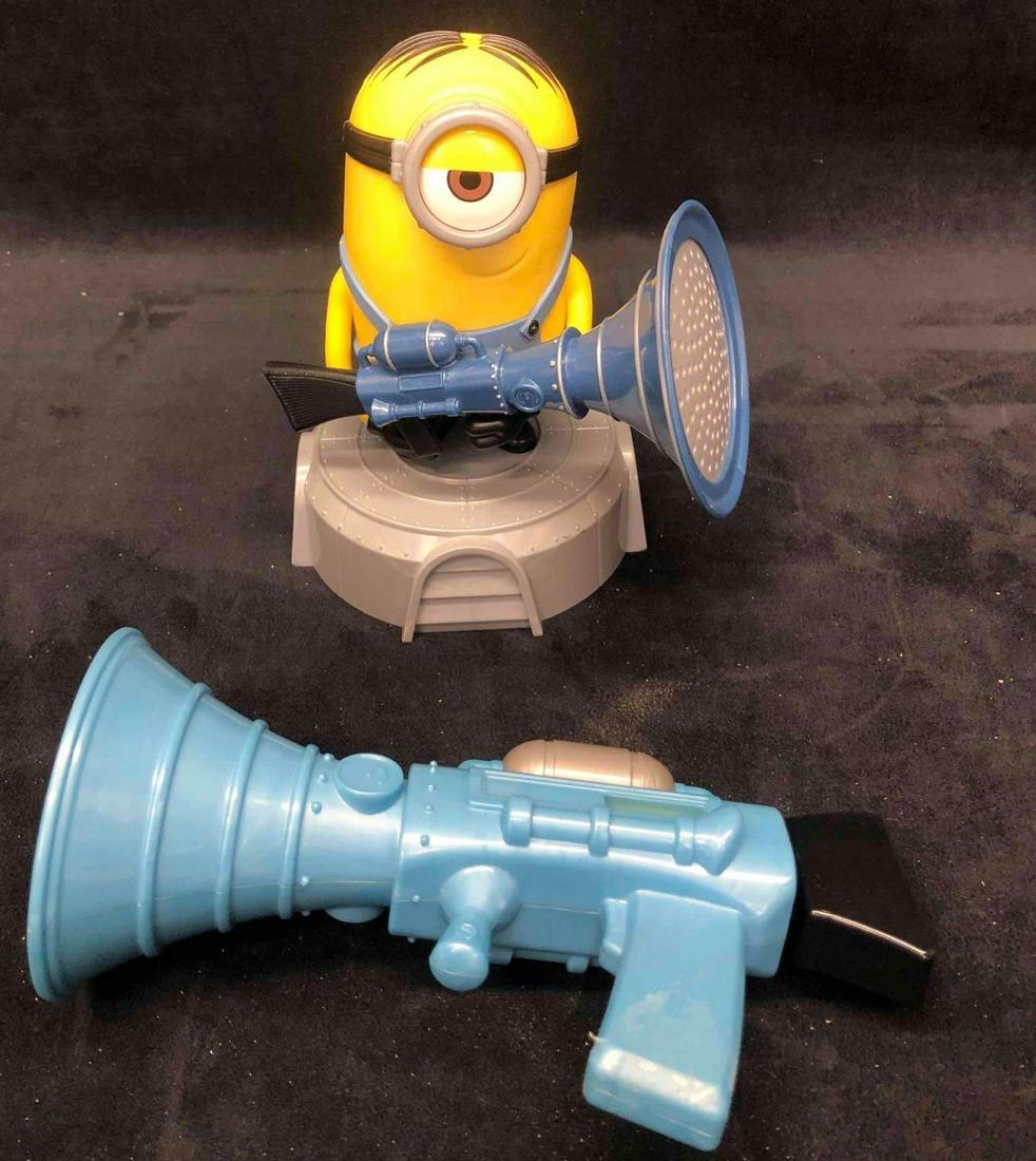 Gas Out Kids Game Minions The Rise Of Gru Featuring Minion Fart Blaster & Life Size Fart Blaster: This lot contains a Gas Out kids game from Minions The Rise Of Gru. The game features a minion fart blaster figurine and a life size fart blaster. Made in China copyright Universal City Studios LLC. B