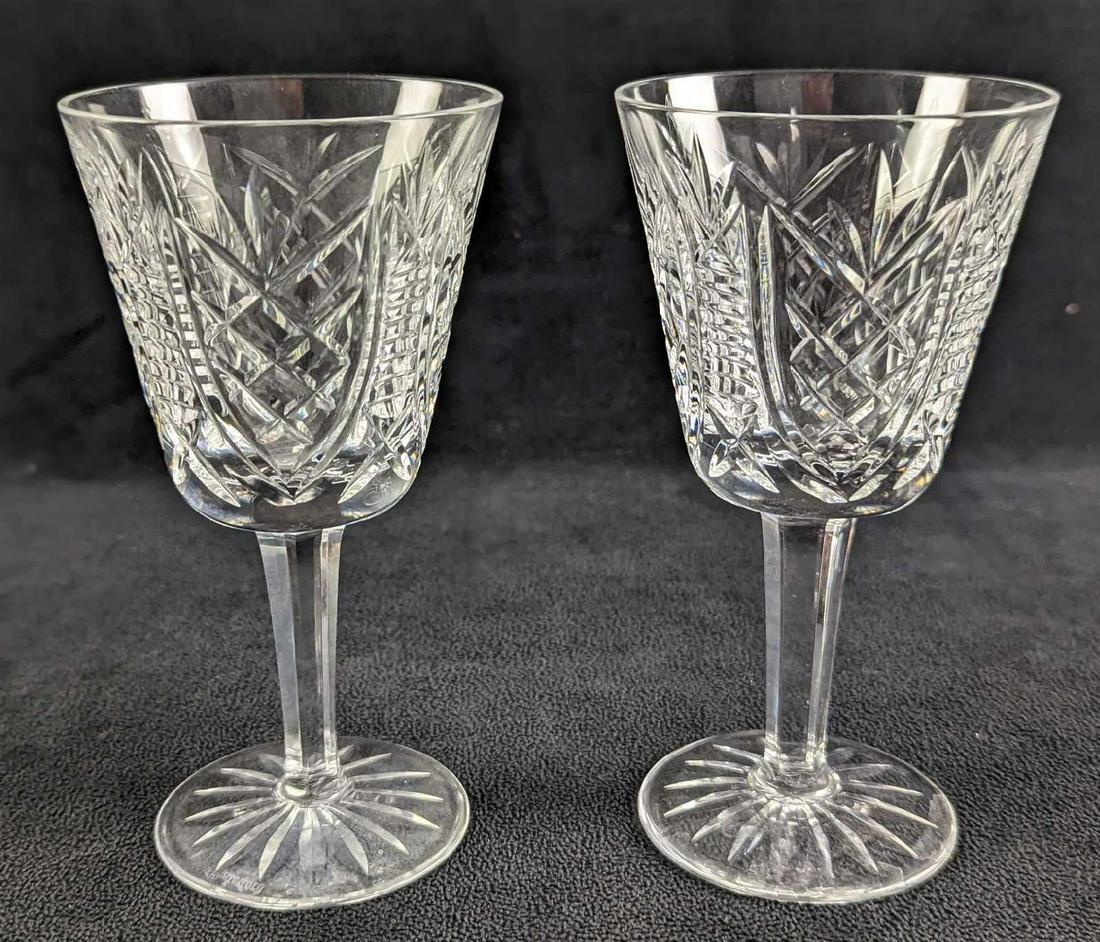 Two Retired Waterford Crystal Clare Cut Goblets: Two Retired Waterford Crystal Clare Cut Goblets. This design was released from 2000 to 2017. Each goblet is approx 3" x 3" x 5 3/4" and together they weigh 1.79lb. The goblets are in a goo