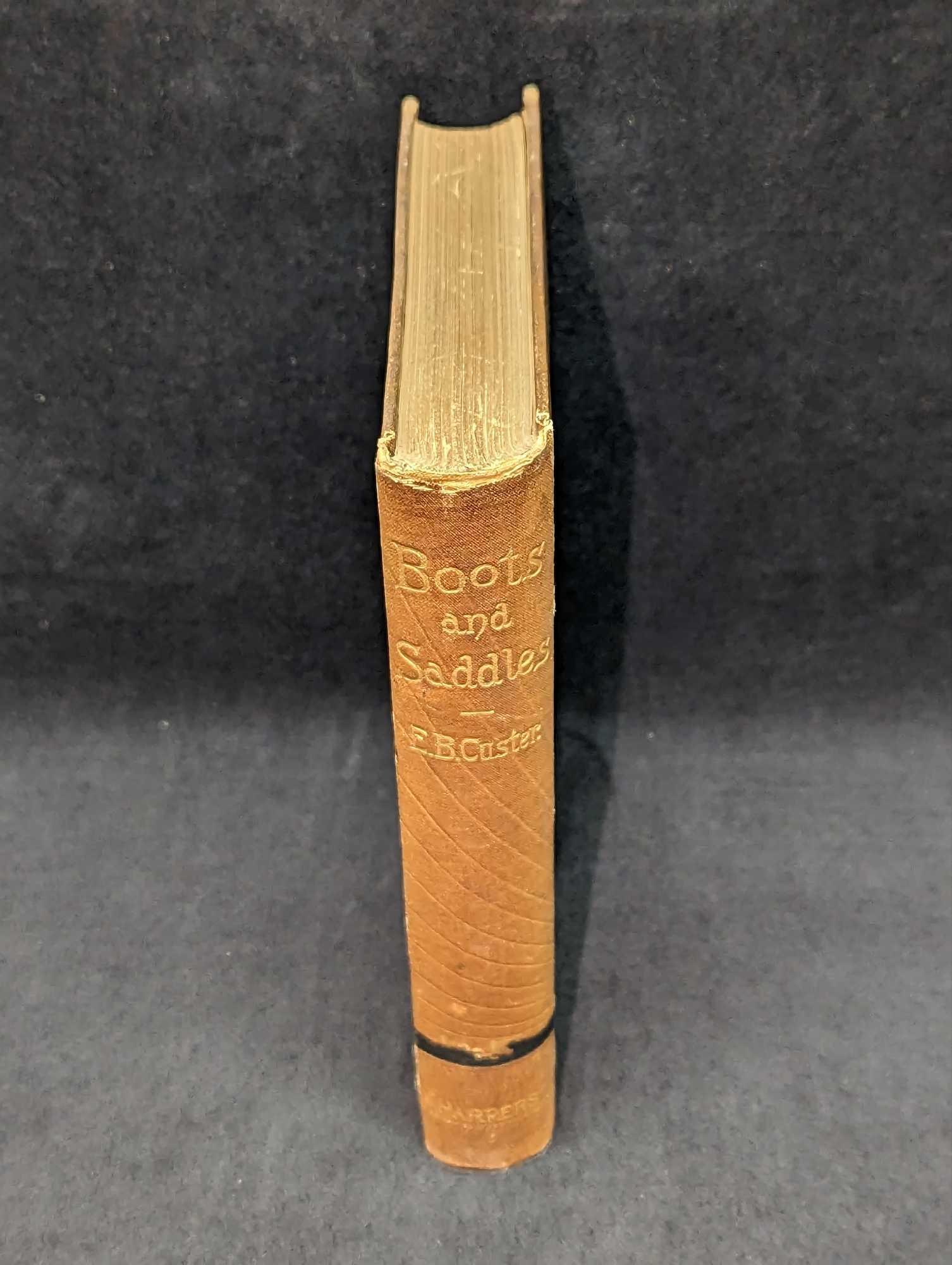 1885 Elizabeth Custer Boots And Saddles Hardcover: 1885 Elizabeth Custer Boots And Saddles Hardcover. This was published by Harper & Brothers (New York) in 1885. This hardcover is approx 5 3/8" x 1 1/4" x 7 1/2" and it weighs 1.13lb. T