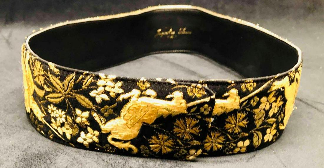 Black & Gold Jacqueline Italy Unicorn Belt: This lot contains Black & Gold Jacqueline Italy Unicorn Belt. It is approx 32 1/2" x 2 1/4" and it weighs about 0.1lbs. Overall the belt is in good used condition with some light wear from