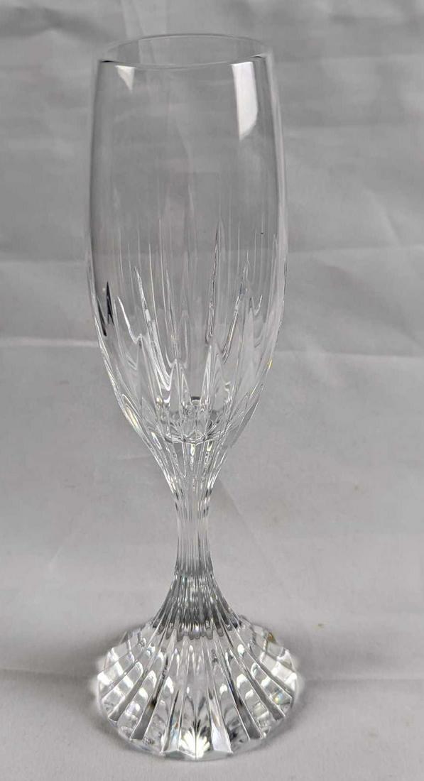 Baccarat Crystal Massena Champagne Flute: Deep orgue bevel cuts are etched directly into the Clear crystal, irradiating from the foot of the glass to the base of the narrow bowl. The intricate detailing gives the Massena glass a barrel-like a