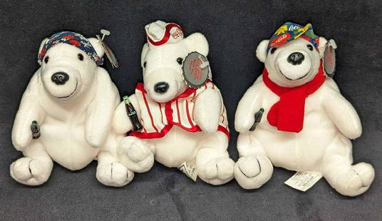 3 Coca-Cola Polar Bears Bean Bag Plush Caps & Outfit: 3 Coca-Cola Polar Bears Bean Bag Plush Caps &amp; Outfit. This lot includes:  (1) Coca-Cola Polar Bear In Blue Night Cap. This was released in 1998. Is approx 5&#34; x 6&#34; x 5 1/2&#34;. (1) Coca-Co