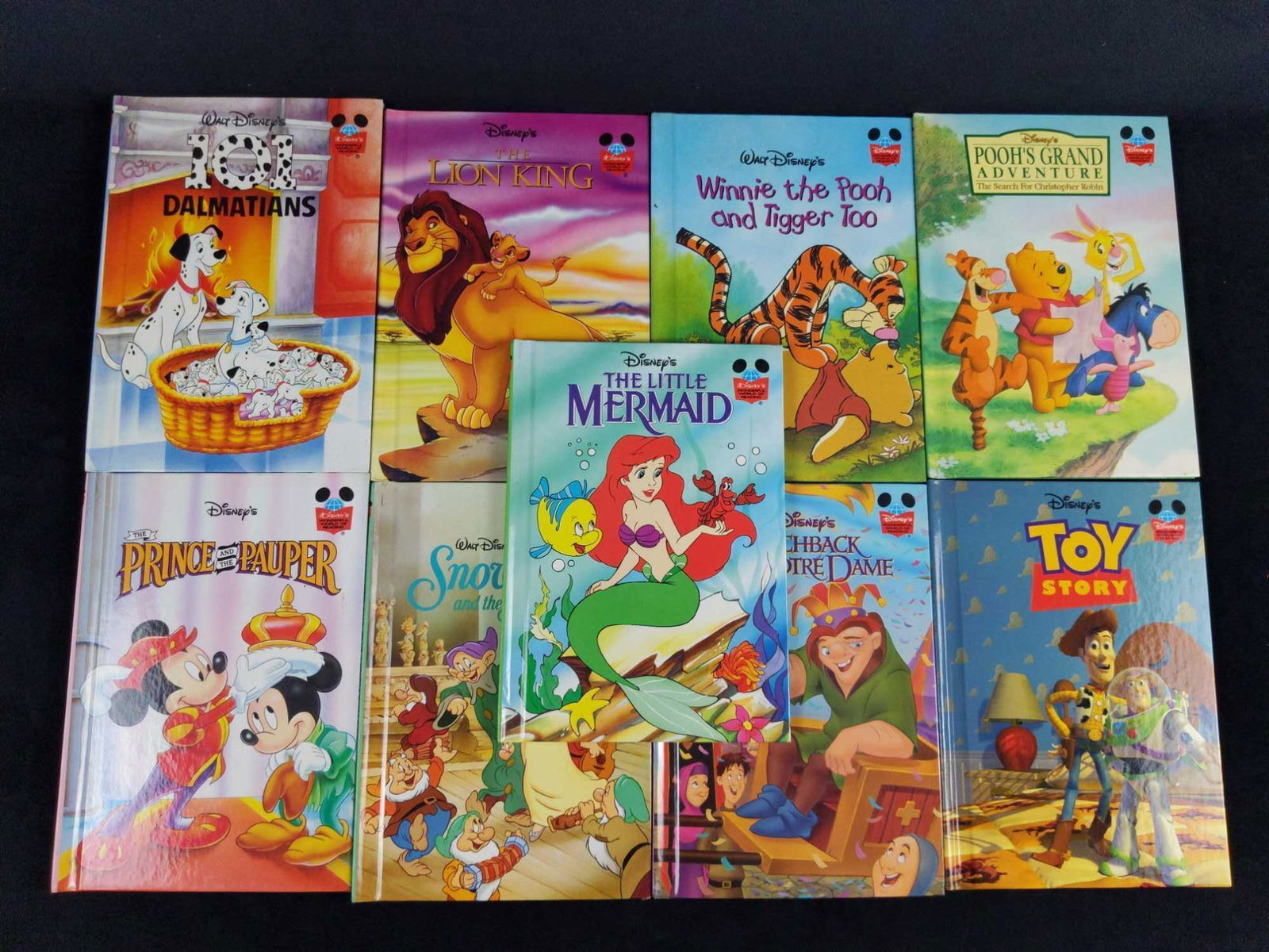 Disneys Wonderful World Of Reading Books Lot Of 9: This lot includes: (1) Winnie The Pooh And Tigger Too. (1) The Lion King. (1) 101 Dalmatians. (1) Toy Story. (1) The Hunchback Of Notr