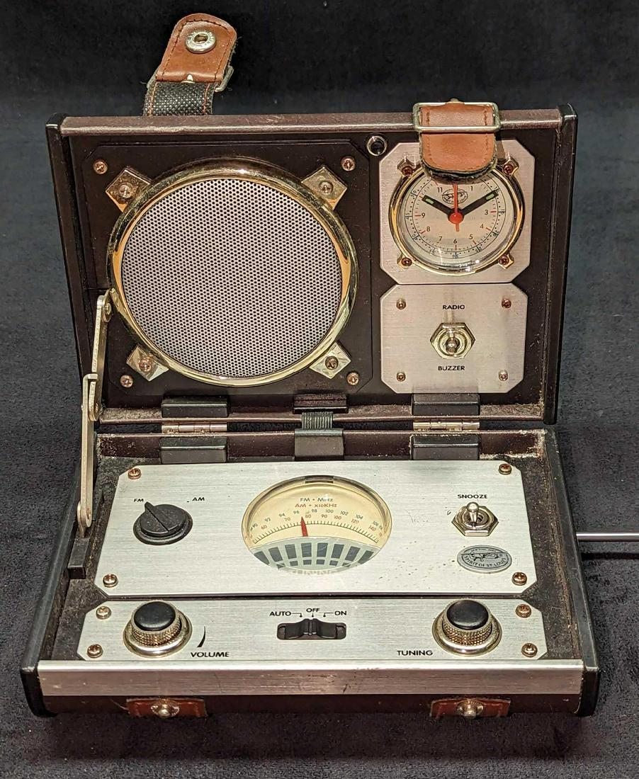 Spirit Of St Louis Travel Series Radio Alarm Clock: Spirit Of St Louis Travel Series Radio Alarm Clock. Requires three AA batteries for the radio and one AAA battery for the clock. Was tested and it works. Is approx 7 1/4" x 5" x 2 1/2" and