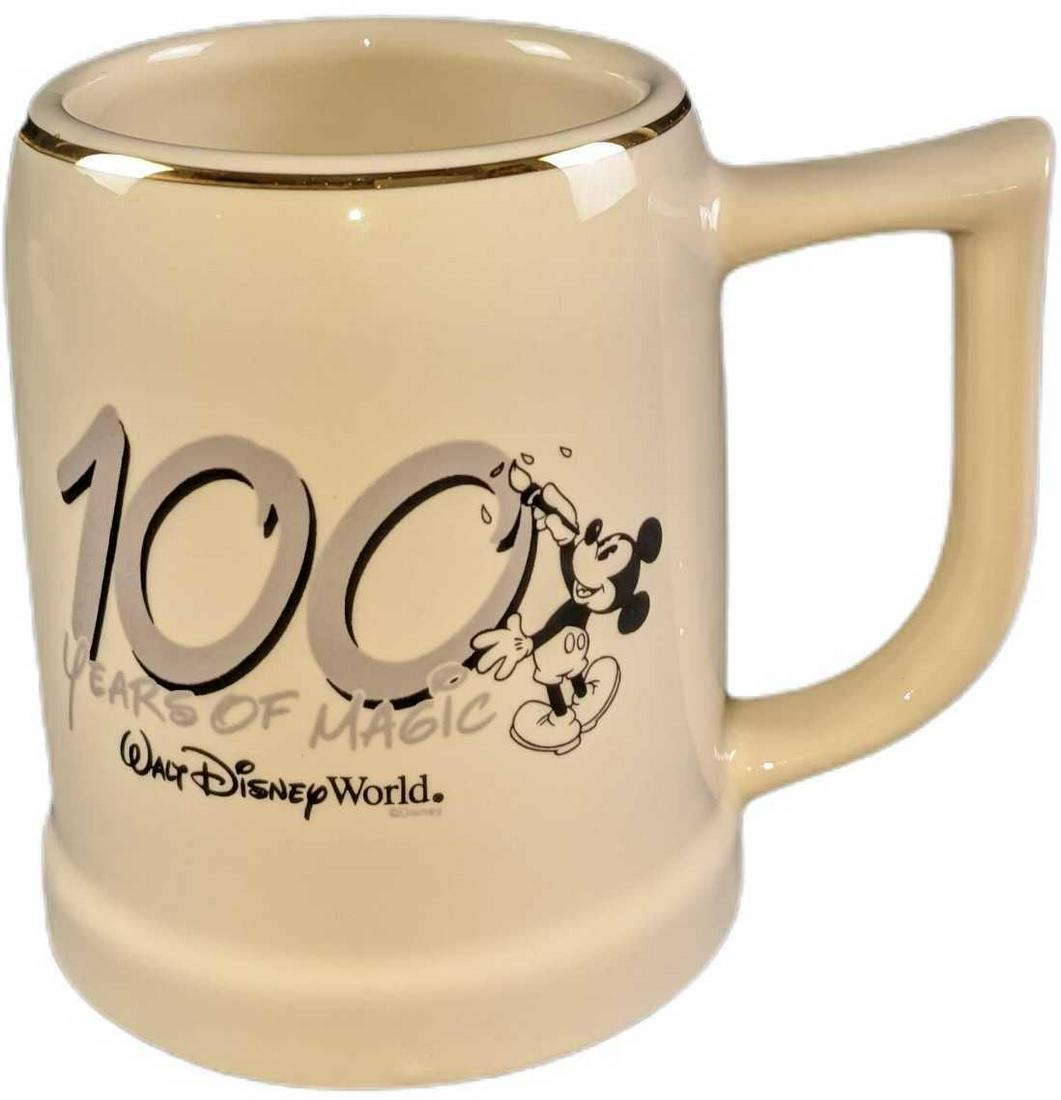 Disney 100 Years Magic 2001 Ceramic 10 Oz Mug: Disney 100 Years Magic 2001 Ceramic 10 Oz Mug. Is approx 5" x 3" x 4 1/2" and it weighs 1.12lb. The mug is in a good, unused condition with no known damage.