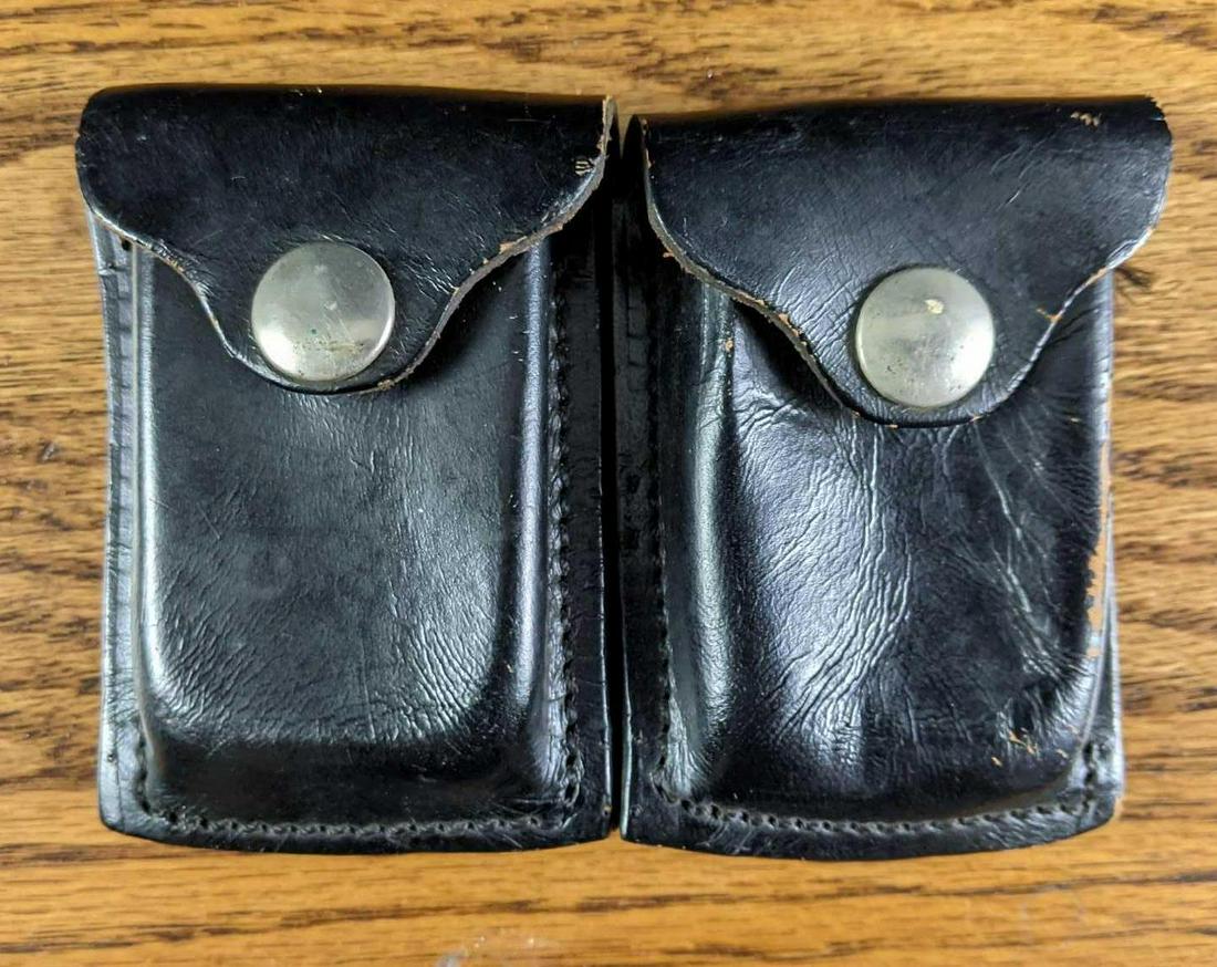 Leather Revolver Ammo Case Atchison Leather: Leather Revolver Ammo Case Atchison Leather This is a black vintage leather revolver ammo case by Atchison Leather Products Co. This case reads on the back " Case Revolver Ammo, USAF 62B4016, 1095