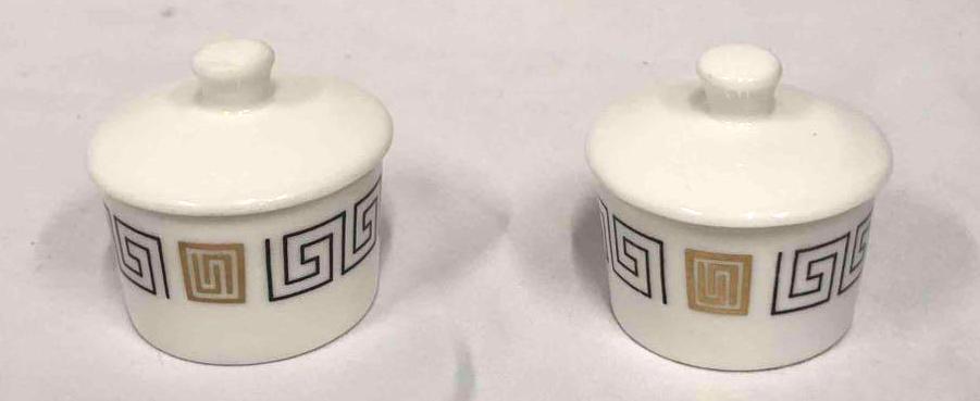 Set Of Two Trinket Boxes Labeled The Mandarin Made With Bone China In England: This lot contains a set of two trinket boxes made with bone china in England. Both boxes are stamped on bottom labeled The Mandarin, made in England, Royal Doulton England Bone China. These boxes are 