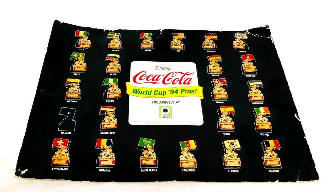 Coca-Cola World Cup '94 Pins Exclusively At Publix: This lot contains Coca-Cola World Cup '94 Pins Exclusively At Publix. It is approx 11" x 14" and it weighs about 0.3lbs. Overall the pins are in good used condition with some light wear fr