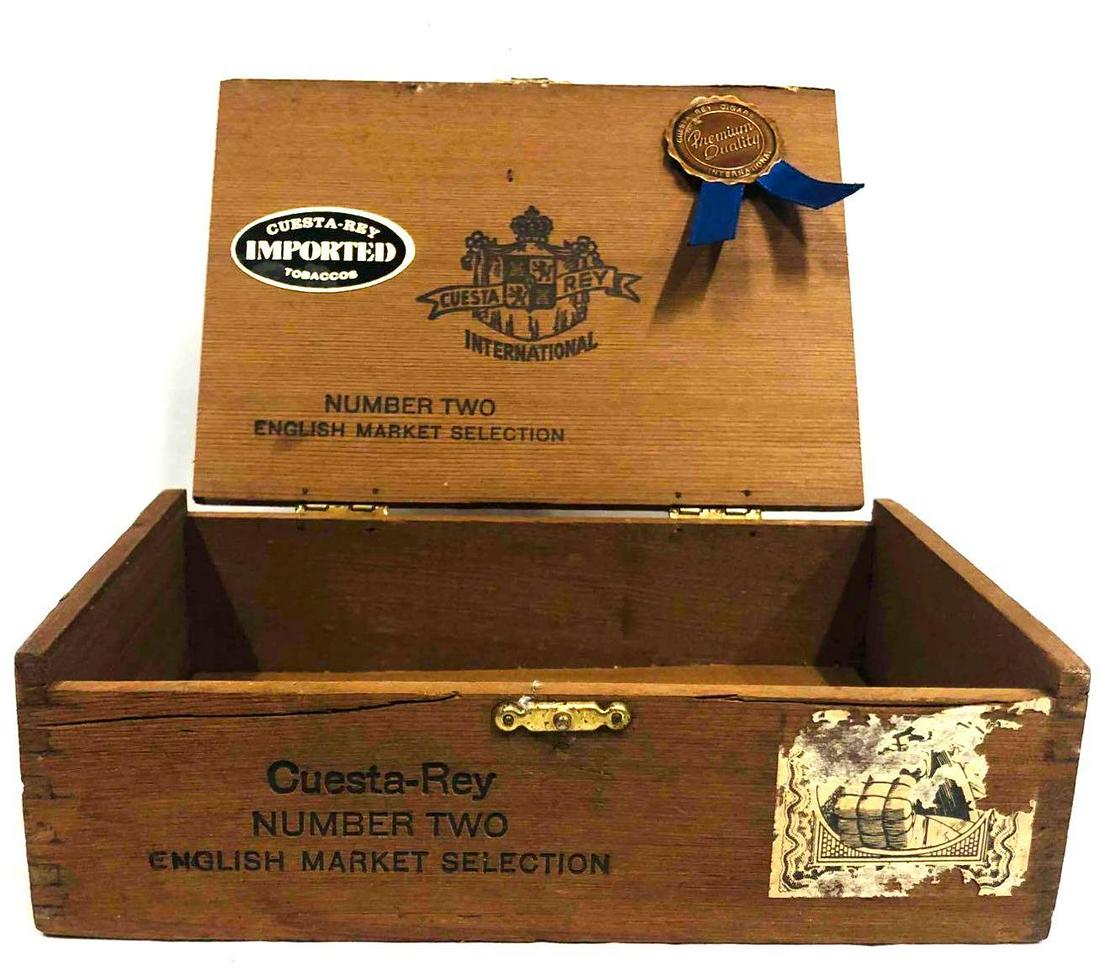Cuesta-Rey Number 2 English Market Selection Wooden Cigar Box: This lot contains Cuesta-Rey Number 2 English Market Selection Wooden Cigar Box. It is approx 7 3/4" x 5 1/4" x 2 1/4" and it weighs about 0.4lbs. Overall the Wood Cigar Box is in good use