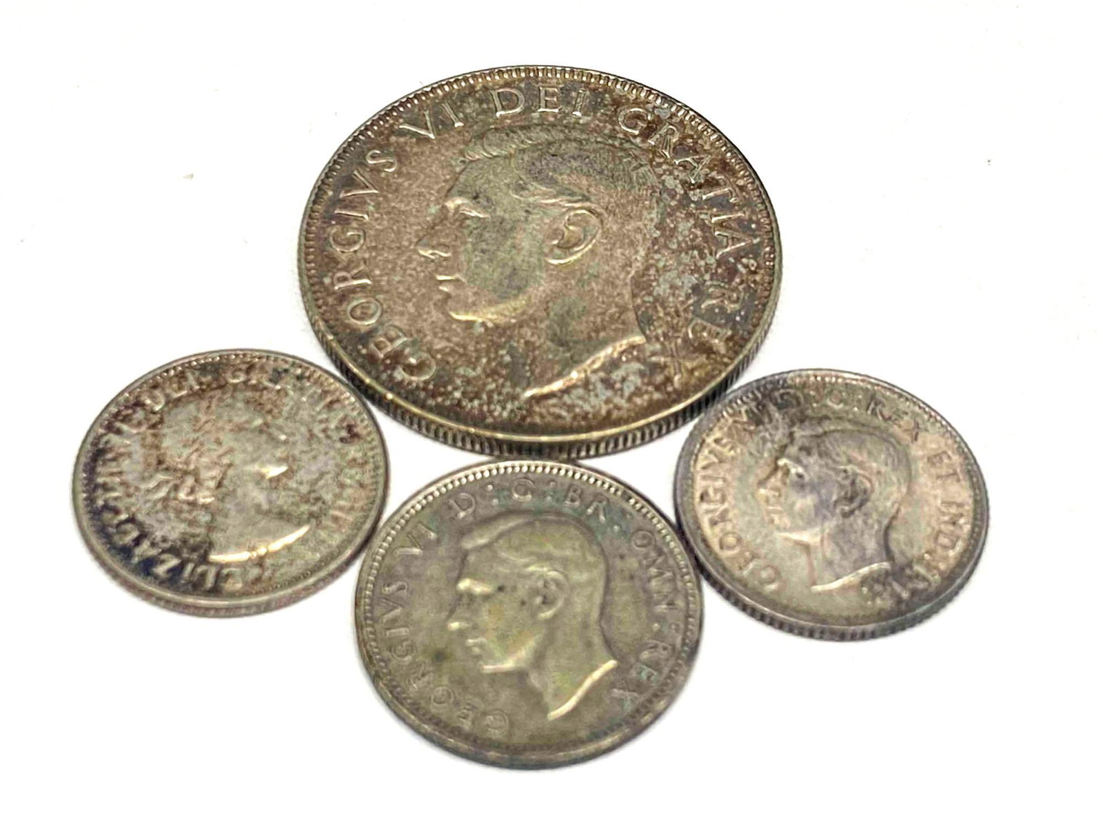 Lot Of 4 Canadian Silver Coins (1 of 2)