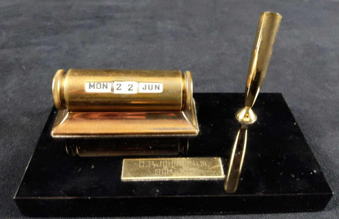 Sheaffer Brass Perpetual Calendar with Pen Holder: Offering a fabulous mid-century Sheaffer Desk Set with Brass Perpetual Calendar and elegant pen holder. Black Onyx Marble Base with a green felt base. The calendar is adjustable by turning the knobs o