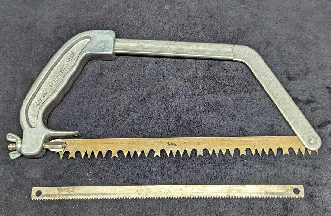 Vintage Compact 2 Blade Wyoming Metal Saw: Vintage Compact 2 Blade Wyoming Metal Saw. Comes apart and is stored in the leather carry case that also can be attached to a belt. Is approx 3 1/4" x 2" x 12" and it weighs 1.21lb. There