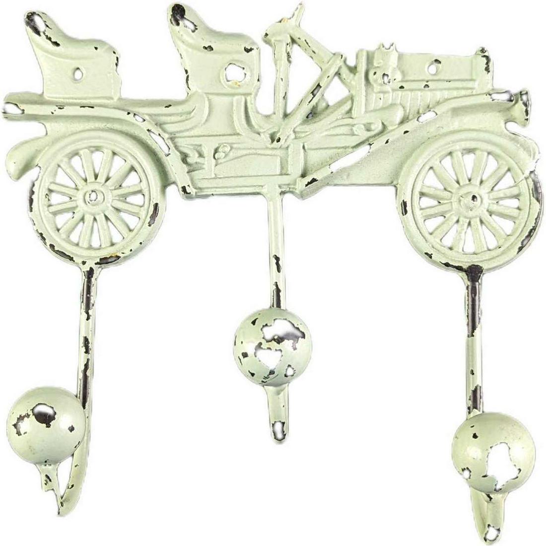 Vintage Reproduction Iron Old Timey Car Rack: Vintage metal rack made to look like an antique. "Wear and Color-Loss" was added by the maker. The rack is approx 10" x 3" x 9" and it weighs 1.88lb. Also comes with screws for eas