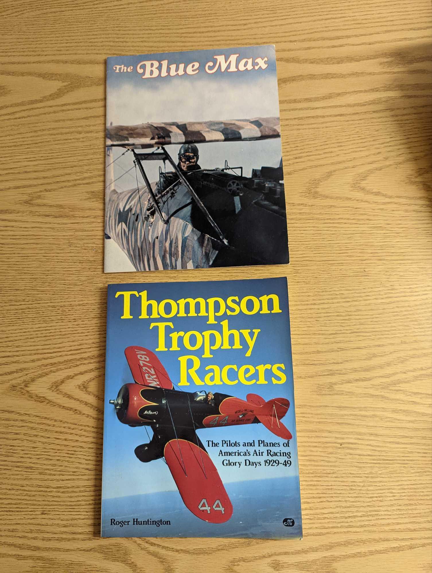 The Blue Max And Thompson Trophy Racers Softcovers: The Blue Max And Thompson Trophy Racers Softcovers. This lot includes: (1) The Blue Max With Art Direction By Robert Geissmann. This was published by Souvenir Programs (New York) and was copyrighted