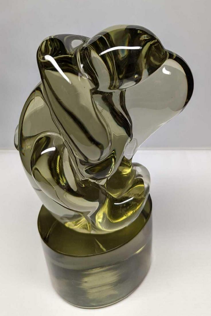 Lucite Lovers Figurine (F52): Lucite Lovers Figurine (F52). This rather heavy figurine shows two lovers in the middle of a kiss. This figurine is signed by the artist, but we could not make out the signature. This is approx 5"