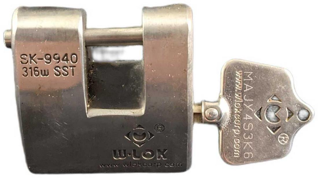 Stainless Steel Viselock Key Lock: Stainless Steel Viselock Key Lock. SK-9940. Is approx 2" x 1" x 2" and it weighs 1lb. The key lock is in a good, used condition with some wear. Please see the images as they are part of th