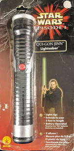 Star Wars Costume Qui Gon Jinn Lightsaber Jedi A: Plastic Star Wars Jedi Knight green lightsaber. Made from sturdy injection-molded plastic with a light-up telescoping blade. Measures approximately 36" once extended. Two AAA batteries not include