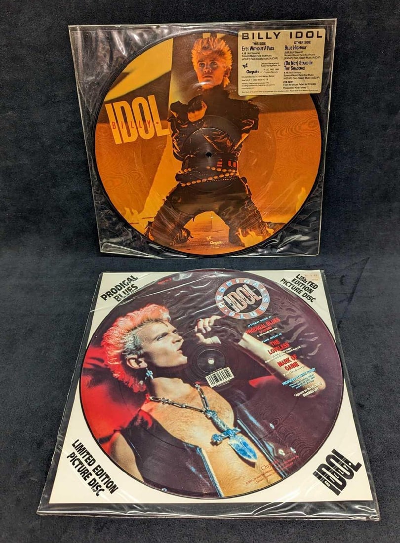 2 Billy Idol Photo Discs LPs: 2 Billy Idol Photo Discs LPs. This lot includes: (1) Billy Idol - Eyes Without A Face/Blue Highway/(Do Not) Stand In The Shadows Picture Disc LP. This was released by Chrysalis in 1984. (1) Billy Ido